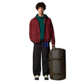 The North Face Base Camp Duffel - Large Outdoor Action NTG-SMKYBRWN-UTLTYBRWN- Product in use