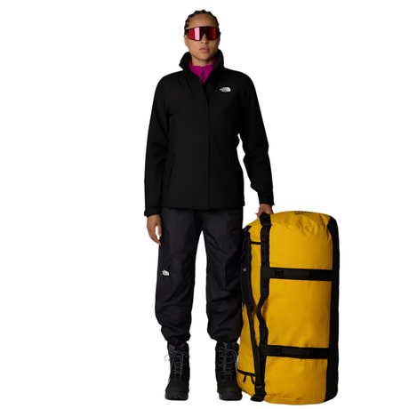 The North Face Base Camp Duffel XXL Yellow - Model with duffel