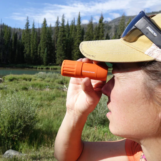 Brunton ECHO® Pocket Monocular Outdoor Action Orange - Product In Use