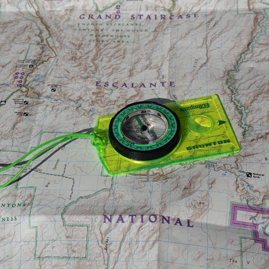 Brunton Recycled Scout ECOmpass Outdoor Action - Inch and millimetre scales