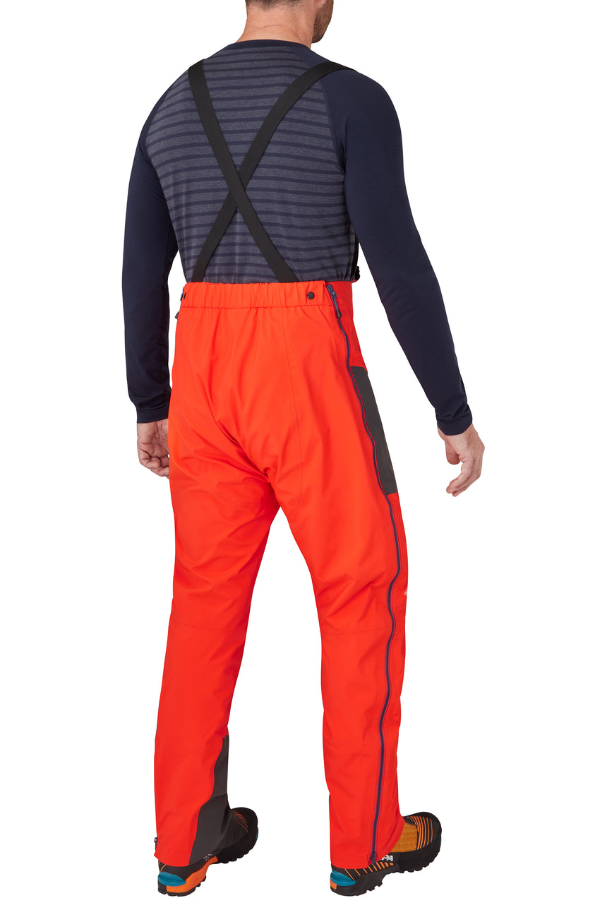 Mountain Equipment Tupilak Men's Pant Outdoor Action Cardinal Orange - Back Angled Fit on Model