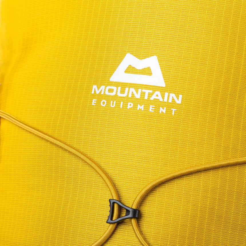 Mountain Equipment Orcus 22+ Backpack Outdoor Action Sulphur - Close up logo image